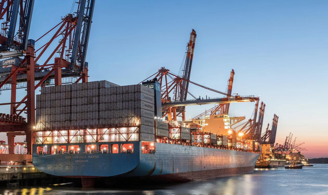 Aerial view of cargo port with shipping containers