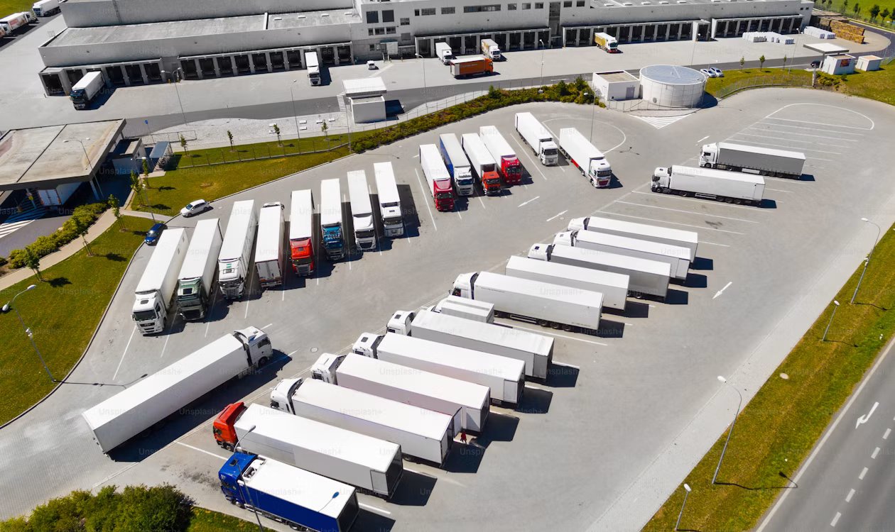 Logistics warehouse with trucks and supply chain operations